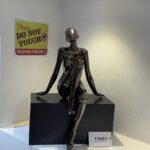 Seated Sculptural Figurine