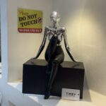 Seated Sculptural Figurine